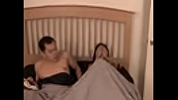 step mom and son watching a bed