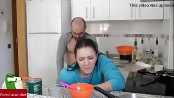 boob grap in kitchen